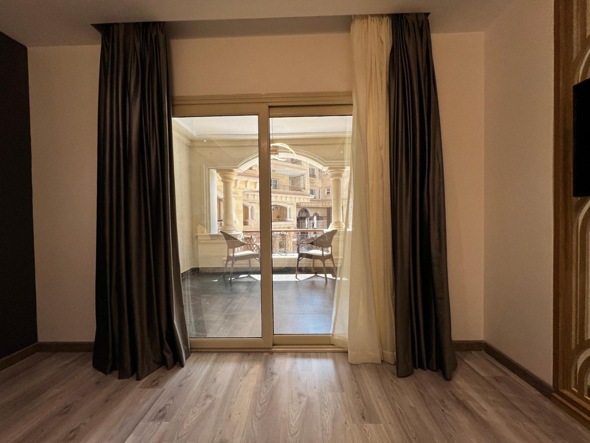 Onyx Pyramids Boutique Hotel Al Kawm al Akhdar Kültér fotó